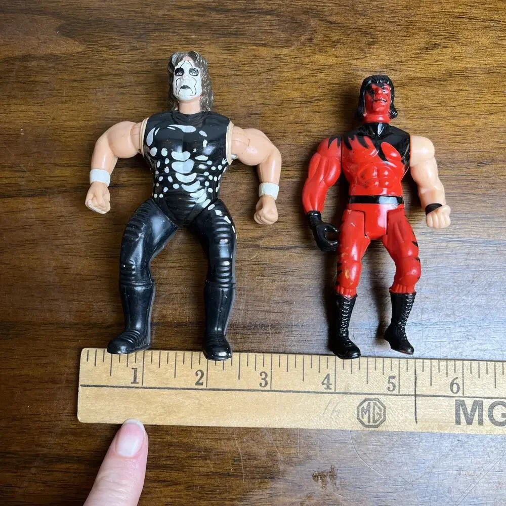 Two (2) 1990s Wrestling Figures. Used As-Is. Moveable Arms And Legs. WWE Style